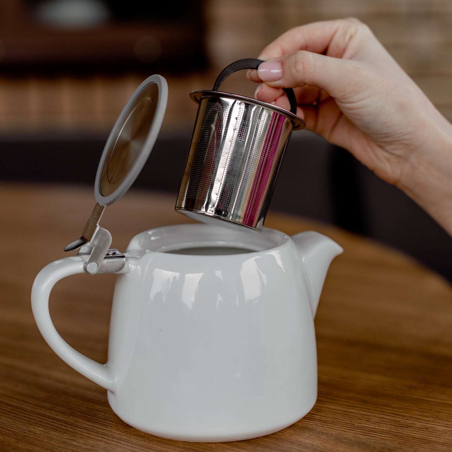 ORNA Ceramic Teapot with Basket Infuser and Stainless Steel Lid in White, 18.6 Oz (550ml)